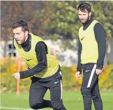  ??  ?? Paul McMullan (left) and James Keatings are put through their paces at Dundee United’s St Andrews training base.