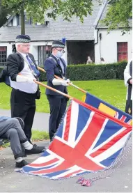  ??  ?? In honour The Union Jack and RBLS standard were a fitting tribute to the historic occasion