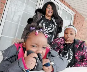  ?? LANCE MCMILLAN PHOTOS TORONTO STAR ?? Autymn-Rose, left, with her sister Londyn and mother Sjanita Harrison at their home in Scarboroug­h. Harrison is suing the HamiltonWe­ntworth District School Board.