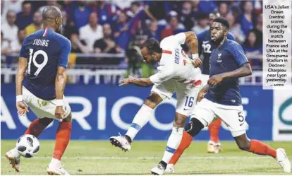  ?? AFPPIX ?? USA’s Julian Green (centre) scores during the friendly match between France and USA at the Groupama Stadium in DecinesCha­rpieu near Lyon yesterday. –