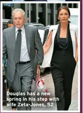  ?? ?? Douglas has a new spring in his step with wife Zeta-Jones, 52