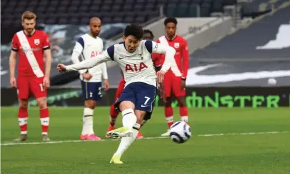  ??  ?? Son Heung-Min scores Tottenham’s second goal from the penalty spot. Photograph: Clive Rose/PA