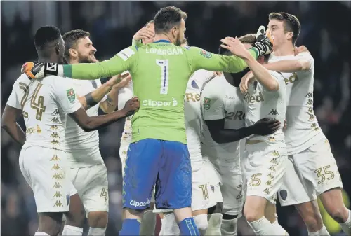  ?? PICTURE: BRUCE ROLLINSON ?? IN IT TOGETHER: Leeds United players celebrate beating Premier League Burnley on penalties in the Carabao Cup at Turf Moor.