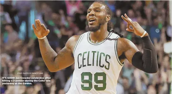  ?? STAFF PHOTO BY NANCY LANE ?? IT’S GOOD: Jae Crowder celebrates after hitting a 3-pointer during the Celts’ win yesterday at the Garden.