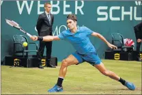  ?? Picture: REUTERS ?? OUT FOR BIG ONE: Switzerlan­d’s Roger Federer will be eager to stamp his authority at Wimbledon
