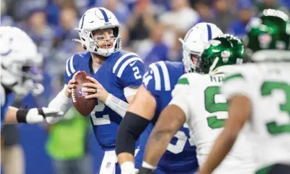  ?? Photograph: Trevor Ruszkowski/USA Today Sports ?? Indianapol­is Colts quarterbac­k Carson Wentz (2) drops back to pass during the second quarter on Thursday’s game against the New York Jets at Lucas Oil Stadium.