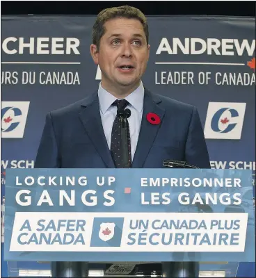  ?? JACK BOLAND/POSTMEDIA NEWS ?? Federal Conservati­ve leader Andrew Scheer talks in Brampton yesterday about his new crime policies.
