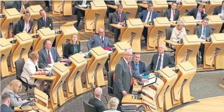  ?? Picture: PA. ?? Scottish Brexit Minister Michael Russell takes the floor at the Scottish Parliament in Edinburgh.