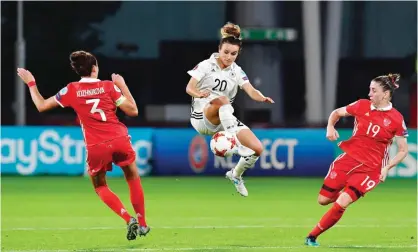  ??  ?? UTRECHT: Germany’s midfielder Lina Magull (C) vies with Russia’s defender Anna Kozhnikova (L) and Russia’s defender Ekaterina Morozova during the UEFA Women’s Euro 2017 football match between Russia and Germany at Galgenwaar­d Stadium in Utrecht on...