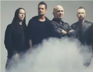  ?? (CAA London) ?? DISTURBED, WITH David Draiman (third from left).