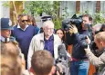  ??  ?? Jeremy Corbyn leaves his home amid a slew of shadow cabinet resignatio­ns