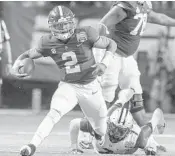  ?? BUTCH DILL/AP ?? Alabama QB Jalen Hurts had a season-low 107 yards of total offense and a dismal 3.24 yards per play against Washington.