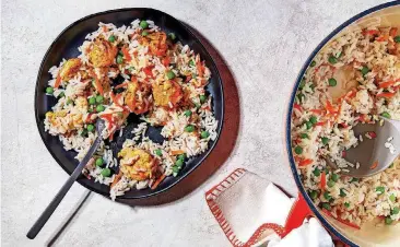  ?? [PHOTO BY STACY ZARIN GOLDBERG, FOR THE WASHINGTON POST] ?? Tandoori-Style Shrimp With Rice and Peas