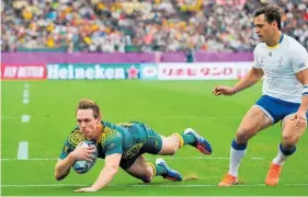  ?? Photo / Getty Images ?? Dane Haylett-Petty scored Australia’s opening try.