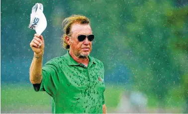  ?? THE COLUMBUS (OHIO) DISPATCH VIA AP ?? Miguel Angel Jimenez waves to the crowd after finishing Saturday’s third round of the U.S. Senior Open at Scioto Country Club in Upper Arlington, Ohio. Jimenez leads the event by one shot.