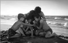  ??  ?? One of the many moving sequences with Cleo and the family she cares for in ‘Roma’ takes place on a beach. — Courtesy of Netflix