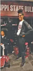  ?? THE ASSOCIATED PRESS ?? Mississipp­i State’s Teaira McCowan poses in the locker room Saturday in Columbus, Ohio. McCowan, who’s 6-foot-7, had 21 points and a Final Four-record 25 rebounds in Friday’s overtime victory against Louisville. The Bulldogs play Notre Dame in the...