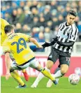  ??  ?? Fall guy: Ayoze Perez is tripped by Corry Evans to win Newcastle their penalty