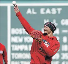  ?? ELISE AMENDOLA
THE ASSOCIATED PRESS ?? Red Sox star Mookie Betts works out at second base at Fenway Park in Boston on Sunday. The Red Sox are preparing for Game 1 of Major League Baseball’s World Series against the Los Angeles Dodgers scheduled for Tuesday in Boston.