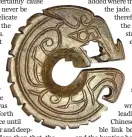  ?? ?? Top: A jade slit-ring shaped dragon from the late Shang Dynasty.