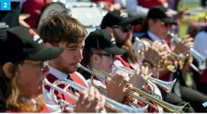  ??  ?? 1 (Previous page) Performing at the 2019 National CAMC Rally
2 The cornets and trumpets of the brass section