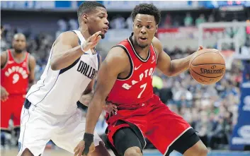  ?? — AP ?? Mavericks guard Dennis Smith defends against Kyle Lowry, who scored a team-high 23 points for the Raptors in a 98-93 loss on Tuesday in Dallas.