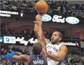  ?? | GETTY IMAGES ?? Kawhi Leonard scored 13 points in 16 minutes Tuesday in his season debut with the Spurs.