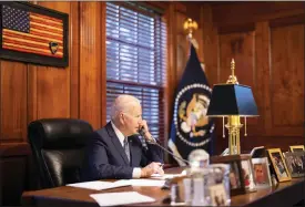  ?? DAM SCHULTZ — THE WHITE HOUSE VIA AP ?? President Joe Biden speaks with Russian President Vladimir Putin on the phone from his private residence in Wilmington, Del., Thursday.