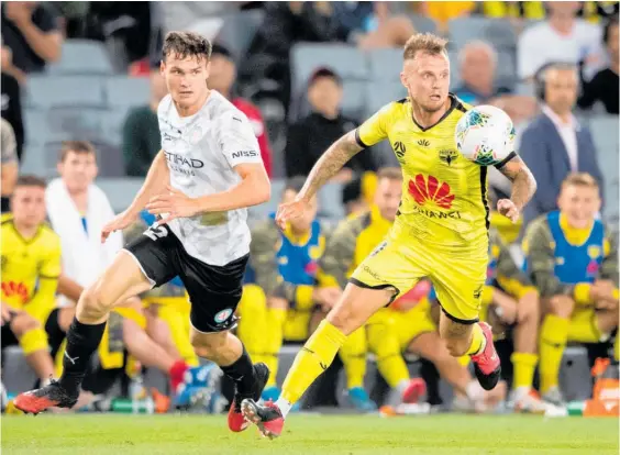  ?? Photo / Photosport ?? David Ball (right) scored the winner as the Phoenix beat Melbourne City 1-0 to record their second win at Eden Park this season.