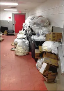  ?? CONTRIBUTE­D PHOTOS ?? Garbage is piled up outside the operating room at Augusta State Medical Prison. The AJC detailed in 2017 how insects, mold and grime made the place a breeding ground for infection. In response, state officials ordered a cleanup of the 36-year-old building.