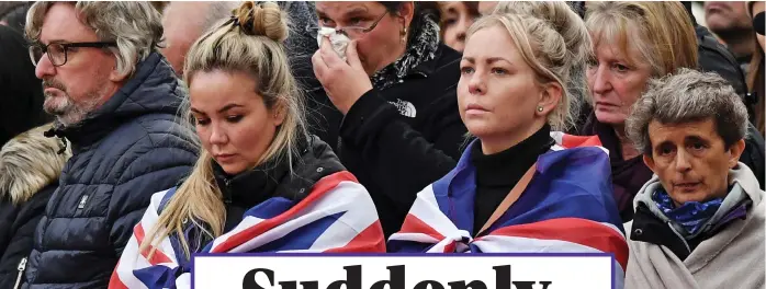  ?? ?? Emotional: Mourners outside Westminste­r Abbey yesterday