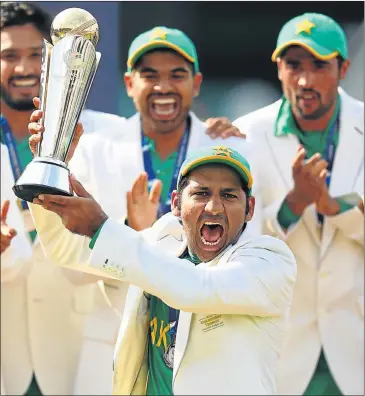  ?? Picture: GETTY IMAGES ?? PROUD MOMENT: Pakistan captain Sarfraz Ahmed celebrates with his teammates after winning the Champions Trophy final against India at The Oval in London yesterday