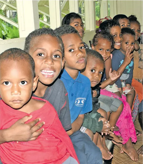  ?? Photo: Ronald Kumar ?? Children from Muanivatu Settlement, Vatuwaqa, taking shelter at St Luke’s Anglican Church hall as they moved to safety during Tropical Cyclone Keni on April 10, 2018.