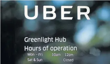  ?? /Reuters ?? Working together: In addition to technical and app support for driver-partners, Uber’s Greenlight Hubs also offer informatio­n sessions and tailored workshops to driver-partners, focusing on training and skills developmen­t.