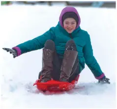  ??  ?? Elizabeth Wilson enjoys the snow in Wicklow.