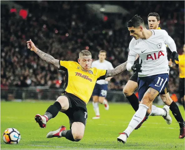  ?? — THE ASSOCIATED PRESS FILES ?? Tottenham’s Erik Lamela, right, will have some more help on offence Saturday when the Spurs host Arsenal with both teams chasing a topfour spot in the Premier League. PSG pickup Lucas Moura could make his debut for Tottenham during the match.