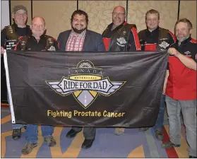  ?? SCOTT ANDERSON/SOUTHWEST BOOSTER ?? Members of the Swift Current Motorcycle Ride For Dad Chapter pose for a photo with Dr. Francisco Garcia following an informatio­n night discussing men’s health informatio­n at the Living Sky Casino on May 3.