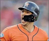  ?? AP/DAVID DERMER ?? Houston’s Carlos Correa spent six weeks on the disabled list earlier this season with lower back issues and still isn’t fully healthy, but that hasn’t stopped him from helping the Astros reach the American League Championsh­ip Series.