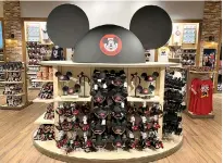  ?? Dewayne Bevil/Orlando Sentinel/TNS ?? ■ The new Mickey Mouse Club collection has traditiona­l headgear with a twist and a related (and shiny) headband. The hat got its start with Disney’s “Mickey Mouse Club” TV show in the 1950s.