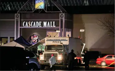  ?? REUTERS ?? Authoritie­s are pictured at the Cascade Mall following reports of an active shooter in Burlington, Washington, on Friday.