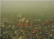  ??  ?? A thick blanket of dust and haze envelops Old Delhi on Thursday. The air quality in Delhi and parts of the National Capital Region on Thursday remained in ‘ poor’ to ‘ hazardous’ category.