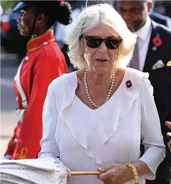  ?? PICTURE: JOE GIDDENS ?? The Duchess of Cornwall visits Commonweal­th War Graves in Accra, Ghana, on day three of the royal couple’s trip to west Africa