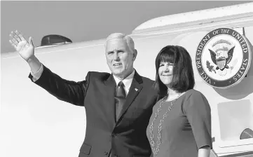 ??  ?? Pence and his wife Karen wave from US Air Force Two as they arrive in Podgorica, Montenegro recently. — Reuters photo