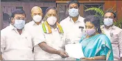  ??  ?? CM V Narayanasa­my hands over his resignatio­n to L-G Dr Tamilisai Soundarara­jan in Puducherry on Monday