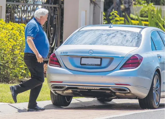  ?? Picture: JERAD WILLIAMS ?? Clive Palmer, leaving his Sovererign Islands home yesterday, has questioned whether the man tracked down in Bulgaria is his nephew.