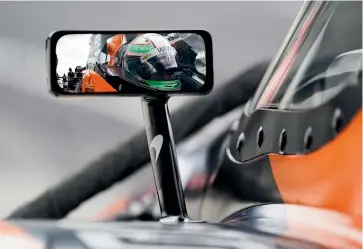  ?? AP ?? Mexican driver Pato O’Ward sits in his car during testing at the Indianapol­is Motor Speedway earlier this month.