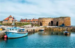  ??  ?? The remains of former kilns at the harboursid­e in Beadnell, with their curved walls. They produced quicklime, used in fertiliser and mortar, until 1822.