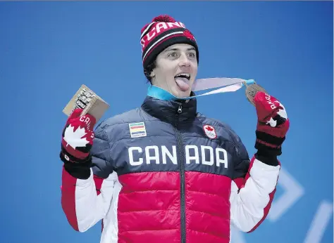  ?? ANDREAS RENTZ/GETTY IMAGES. ?? Regina’s Mark McMorris stands on the podium after winning a Winter Olympics bronze medal in snowboard slopestyle.