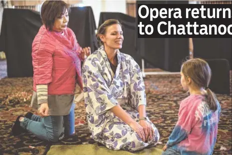  ?? STAFF PHOTOS BY DOUG STRICKLAND ?? Shannon Kessler Dooley, center, plays Madame Butterfly in the CSO production of the opera tonight and Saturday. Willa Grace Hansard, right, plays her son, Sorrow, and Mika Shigematsu, left, is Suzuki.