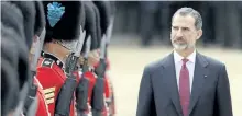  ?? GETTY IMAGES ?? King Felipe VI of Spain inspects a guard of honour with Britain’s Prince Philip (not shown) during a Ceremonial Welcome on Horse Guards Parade on Wednesday in London, England.